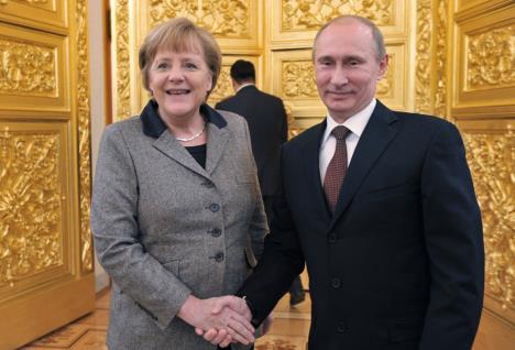 najmocniji-putin-merkel-beta-ap.jpg