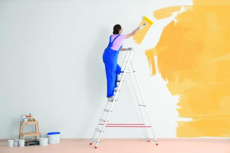 stockphotodecoratorpaintingwhitewallinyellowcolorwithroller1013310346-sm.jpg