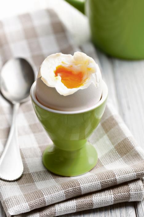 stockphotoboiledeggineggcuponwoodentable118682839.jpg