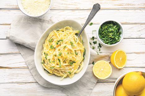 stockphotopastaallimonedeliciousitalianmealspaghettiwithparmesanbutterandlemonsaucetopped1624509778.jpg