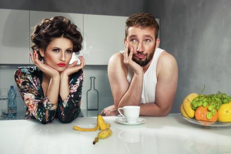 stockphotofunnycoupleafterbreakfaststrangefacesyoungmanandbeautywomaninkitchen220008559.jpg