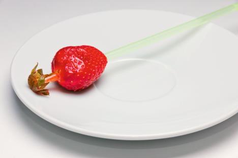 stockphotohowtoremovethetailfromstrawberriesusingacocktailstick283693193.jpg