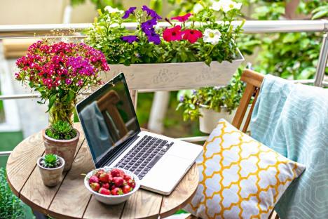 stockphotobeautifulterraceorbalconywithsmalltablechairandflowerstonedimage282159782.jpg