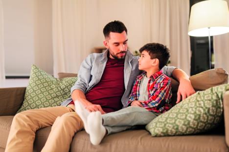 stockphotofamilyrelationshipsandtrustconceptfathertalkingtohissadlittlesonathomeinevening1398231200.jpg