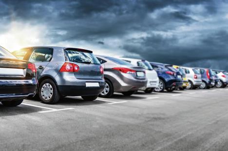 stockphotocarsintheparkinglotparkingpassengercars1406601752.jpg