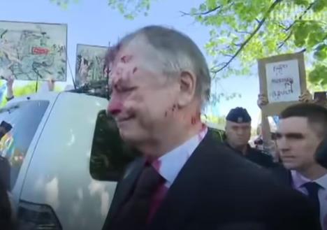 20230509-12-18-13russian-ambassador-to-poland-pelted-with-red-paint-at-ve-day-gathering---poland-.jpg