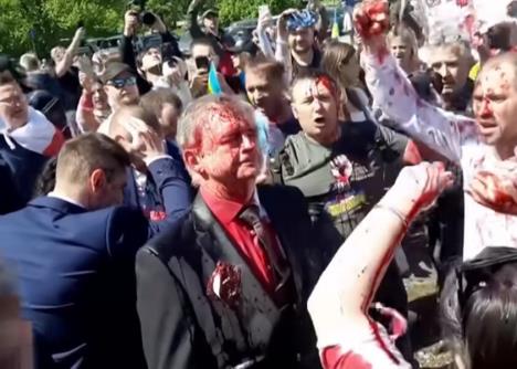 20230509-12-17-39russian-ambassador-to-poland-pelted-with-red-paint-at-ve-day-gathering---poland-.jpg