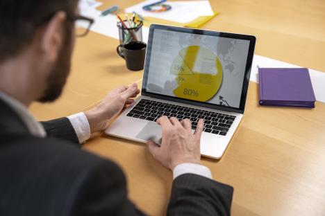 close-up-man-working-with-laptop.jpg