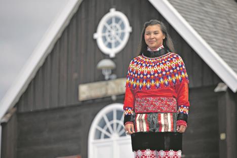 stock-photo-ilulissat-greenland-june-young-inuit-woman-in-traditional-clothing-posing-for-photos-2348995063.jpg