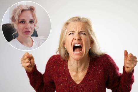 Marija Benin/žena u bordo džemperu stisnutih pesnica koja viče, koncept bes