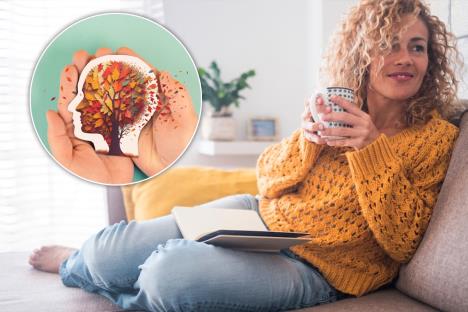 žena u žutom džemperu pije čaj i čita/crtež glave sa mozgom u vidu jesenjeg lišća koje opada