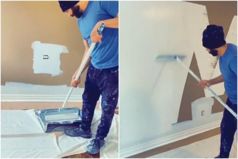 Muškarac kreči zid senf nijanse valjkom u TikTok viralnom videu