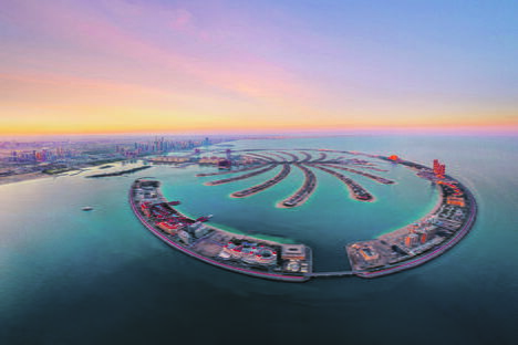 stock-photo-aerial-view-of-the-palm-jumeirah-island-dubai-downtown-skyline-united-arab-emirates-or-uae-1633381783.jpg