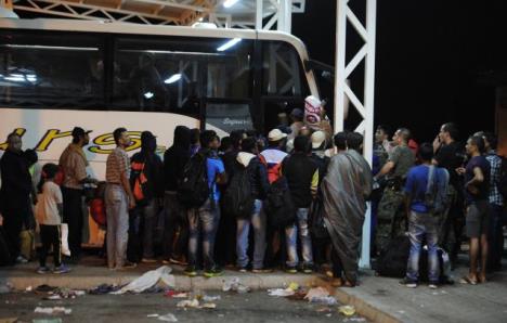 migranti-autobus.jpg