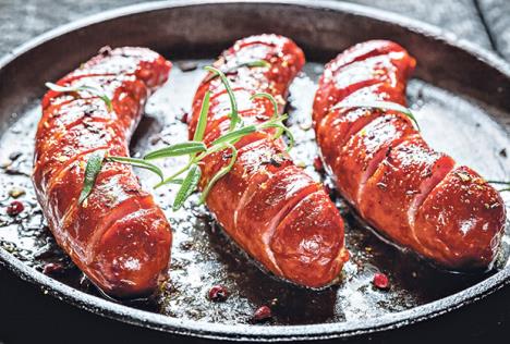 stockphotogrilledsausagewithfreshrosemaryonhotbarbecuedish258871730.jpg