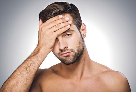 1-stockphotofeelinghopelessportraitoffrustratedyoungshirtlessmanlookingawayandtouchingforehead295914653.jpg