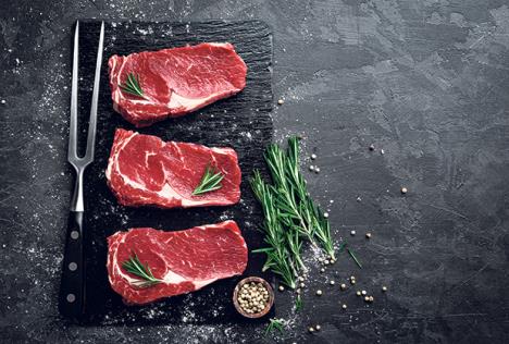 meso-stockphotorawmeatbeefsteakonblackbackgroundtopview603406094.jpg