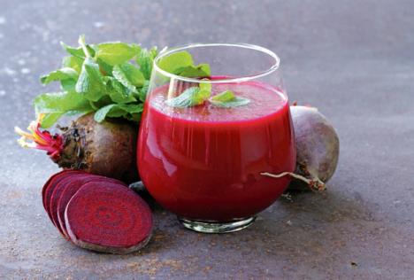 stockphotofreshbeetjuicewithmintleafinaglass243530857.jpg