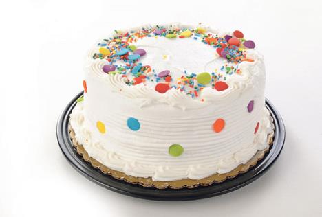 stockphotoawhitepartycakeonawhitetablecloth93148834.jpg