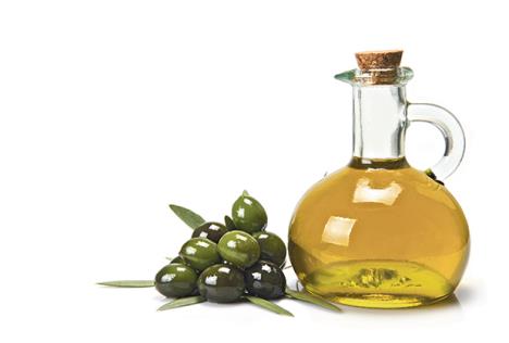 stockphotoglassbottleofpremiumvirginoliveoilandsomeoliveswithleavesisolatedonawhitebackground115229260.jpg