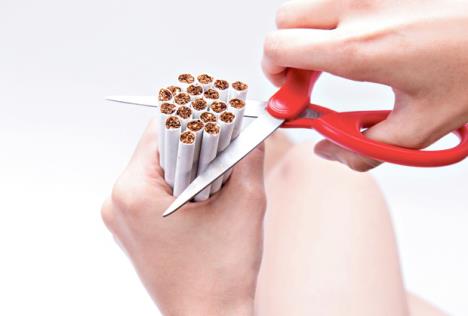 stockphotocloseupofwomanshandusingscissortocutordestroycigarettesfornosmokingconceptor742441930.jpg