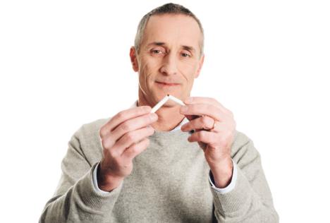 stockphotosuccessfulmanwithbrokencigarette499319590.jpg