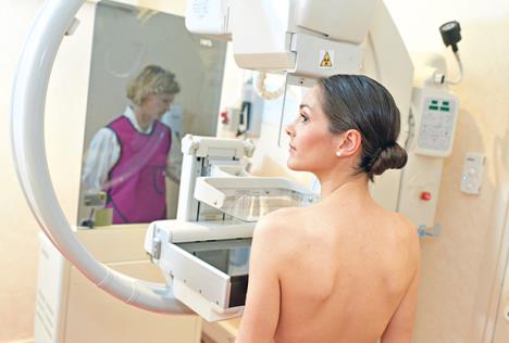 stockphotofemalepatientundergoingmammographytestinhospital724091374.jpg