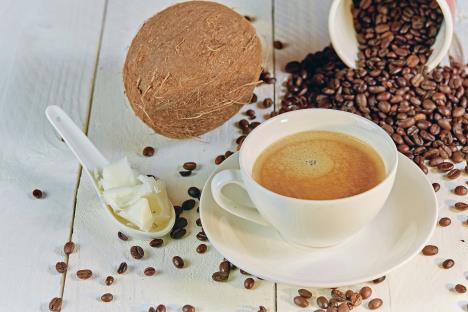 kokosovo-mleko-stockphotocoffeebeansandcoconutonwhitetableforcoffee551221108.jpg