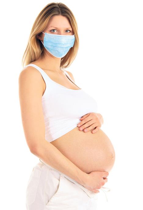 stockphotopregnantwomaninaprotectivemaskisolatedonwhite74882437.jpg