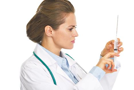 stockphotodoctorwomanwithsyringe150375302.jpg