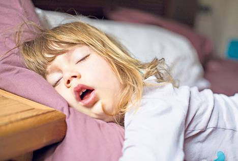 stockphotofunnyfaceexpressionwithopenmouthofblondecaucasianthreeyearsoldchildsleepingonking627992219.jpg