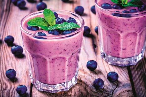 ljubisti-smutistockphotoblueberrysmoothiewithmintinaglassonarustictable588244406.jpg