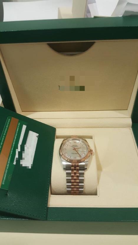 zaplenjeni-zenski-rolex-censored.jpg