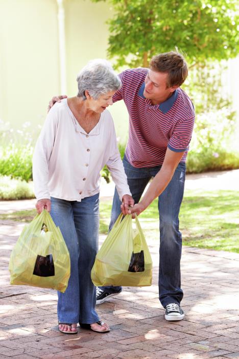 stockphotomanhelpingseniorwomanwithshopping290611874-1.jpg