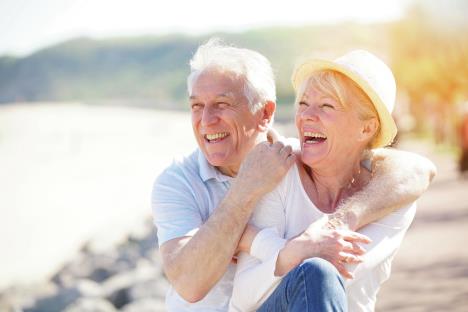 stockphotoseniorcouplerelaxingbytheseaonsunnyday623697488.jpg