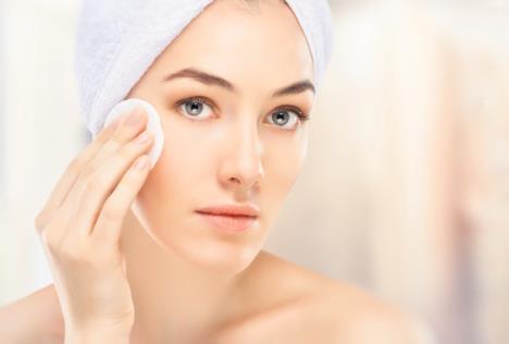 stockphotobeautifulwomanapplyingcosmeticcream245538358.jpg