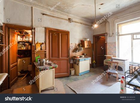 1008-stockphotodirtykitchenwithfurnitureandgasstovesisintheapartmentfortemporarylivingexistence1011655474.jpg