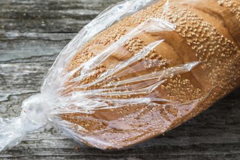 stockphotobreadwithsesameseedsinplasticbagonthetable797568214.jpg