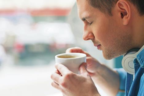 stockphotoattractiveguyisenjoyinghotbeverage427694869.jpg