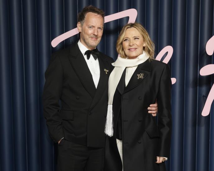 Kim Katral, Rasel Tomas