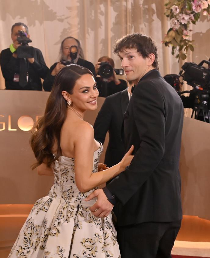 Mila Kunis, Ešton Kučer