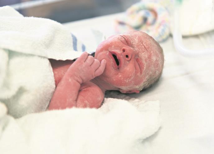 0905 stock-photo-tiny-newborn-baby-weighing-just-over-lbs-less-than-minutes-old-1139138813.jpg